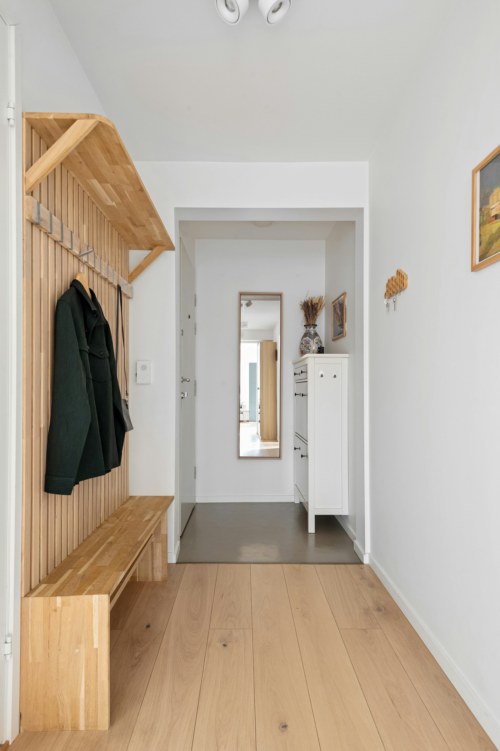 Entryway bench with room for shoes and small daily essentials